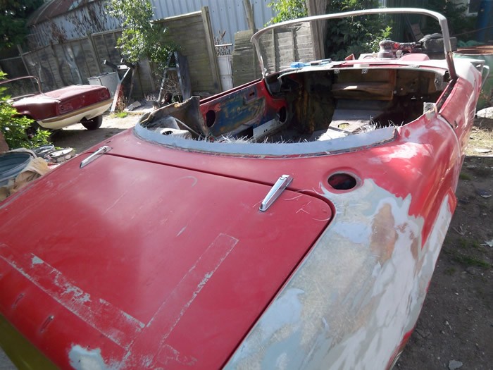Lotus Elan Sprint before restoration, with faded and patched paintwork