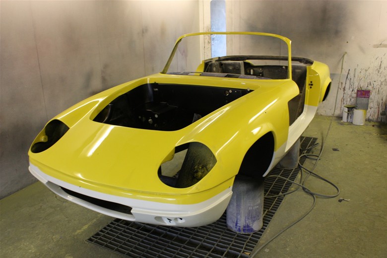 Yellow Lotus Elan body in the spray booth