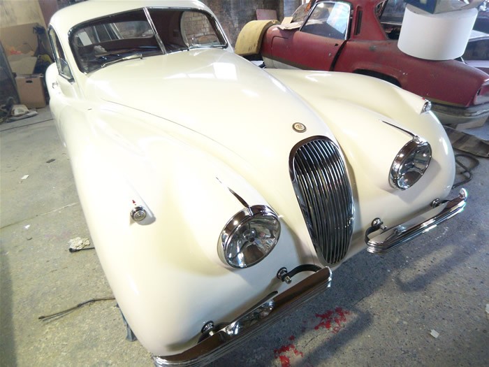 Jaguar XK140 in cream, freshly painted in the workshop